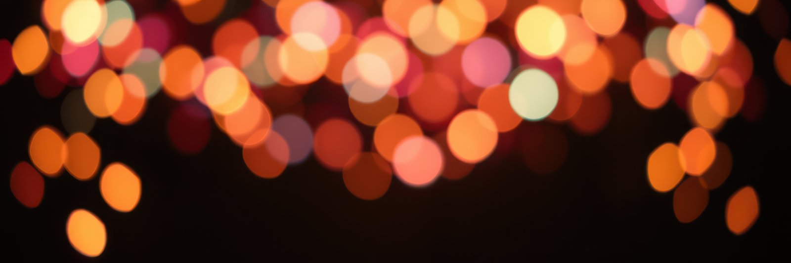 Colorful bokeh lights creating a festive atmosphere for celebrations during the evening